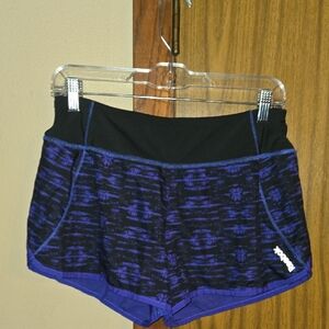 Reebok Women's Black and Purple Patterned Shorts